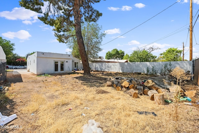 view of yard with french doors