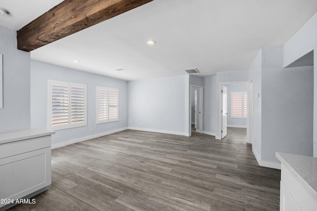 unfurnished living room featuring wood-type flooring