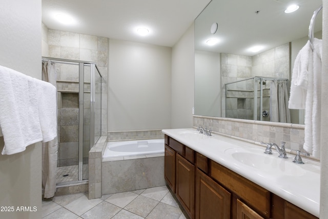 3935 E Rough Rider Rd Unit 1039, Phoenix, AZ 85050 - bathroom featuring a stall shower, a garden tub, tile patterned floors, and double vanity