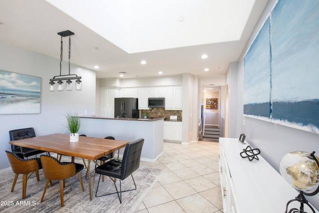 3935 E Rough Rider Rd Unit 1039, Phoenix, AZ 85050 - dining area featuring light tile patterned floors, stairs, and recessed lighting