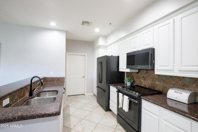 3935 E Rough Rider Rd Unit 1039, Phoenix, AZ 85050 - kitchen with black appliances, a sink, white cabinets, dark stone countertops, and recessed lighting