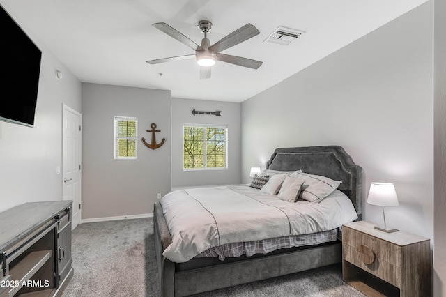 3935 E Rough Rider Rd Unit 1039, Phoenix, AZ 85050 - bedroom featuring light colored carpet, baseboards, and ceiling fan