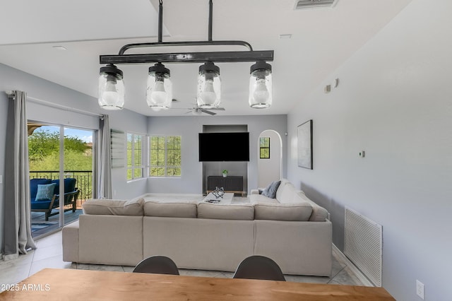 3935 E Rough Rider Rd Unit 1039, Phoenix, AZ 85050 - living area with light tile patterned flooring and ceiling fan