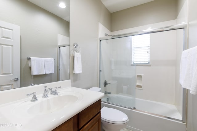 3935 E Rough Rider Rd Unit 1039, Phoenix, AZ 85050 - bathroom with toilet, vanity, and bath / shower combo with glass door
