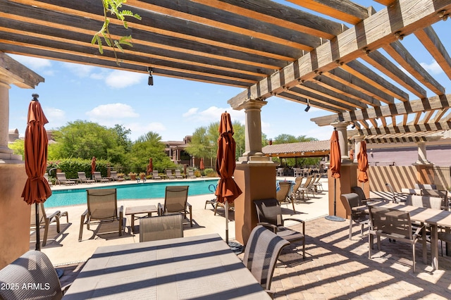3935 E Rough Rider Rd Unit 1039, Phoenix, AZ 85050 - view of patio featuring a pergola, a community pool, and outdoor dining area