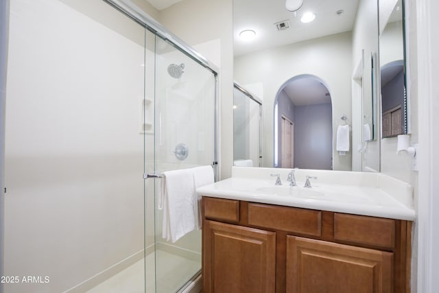 3935 E Rough Rider Rd Unit 1039, Phoenix, AZ 85050 - full bathroom featuring vanity and a shower stall