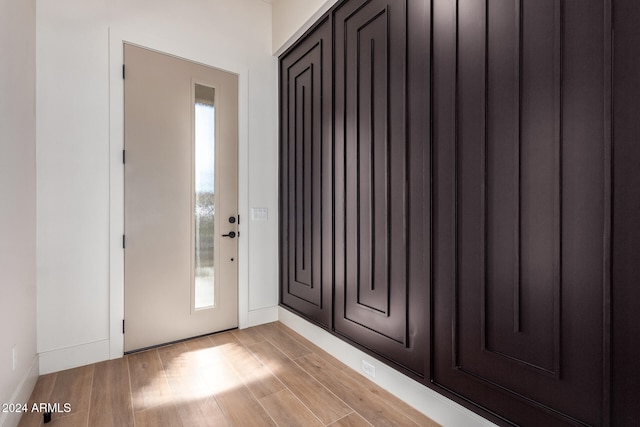 foyer with light wood-type flooring