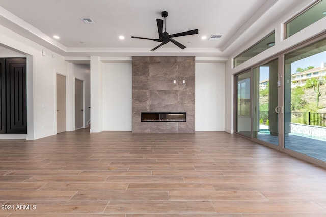 15522 E Chicory Dr, Fountain Hills, AZ 85268 - unfurnished living room with ceiling fan, light wood-style flooring, a high end fireplace, baseboards, and recessed lighting