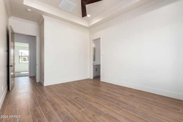 15522 E Chicory Dr, Fountain Hills, AZ 85268 - unfurnished room with crown molding, wood finished floors, baseboards, and a raised ceiling