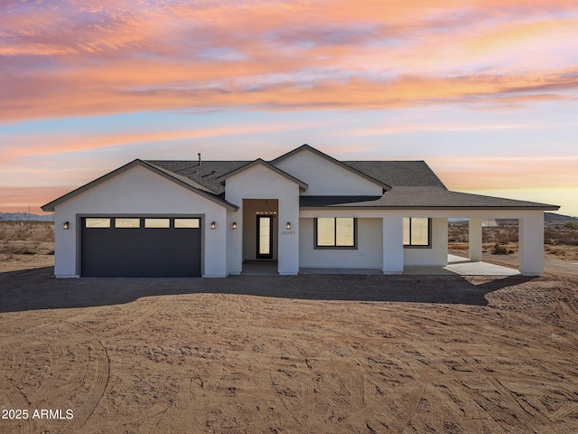 view of front of home with a garage