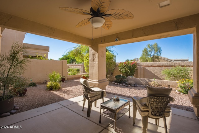 view of patio featuring ceiling fan