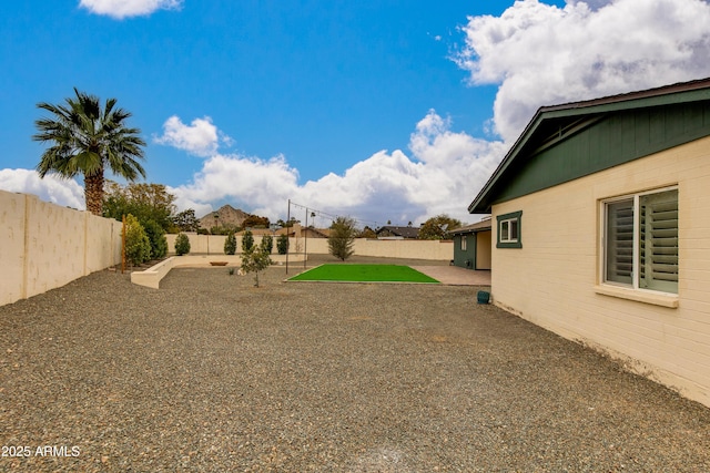 view of yard with a patio area and a fenced backyard