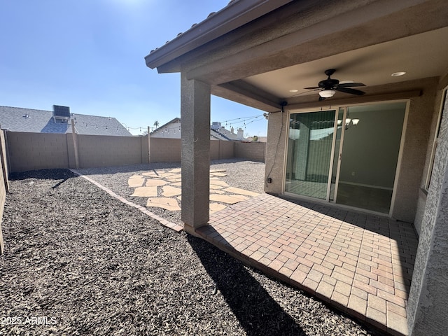 view of patio / terrace featuring ceiling fan