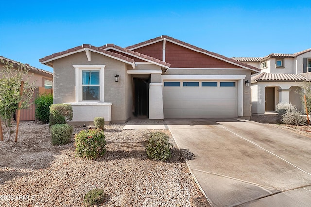 view of front of property with a garage