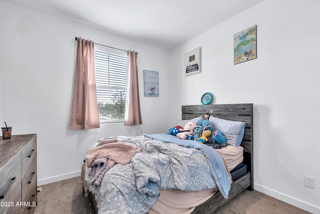 bedroom featuring light colored carpet