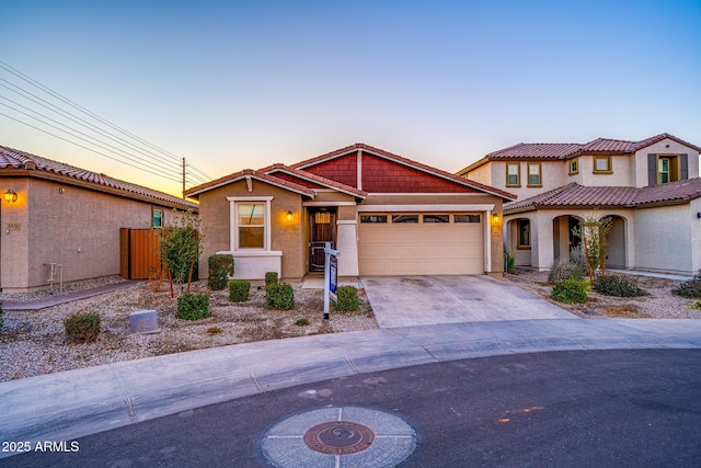 view of front of home with a garage