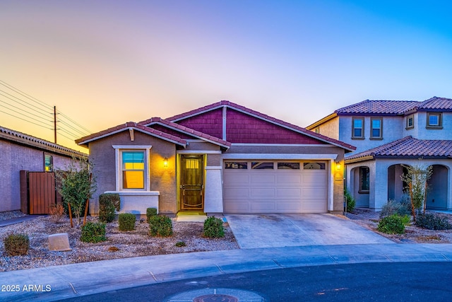 view of front of property featuring a garage