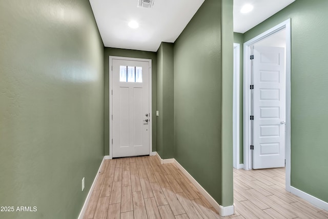 entryway with light wood-type flooring