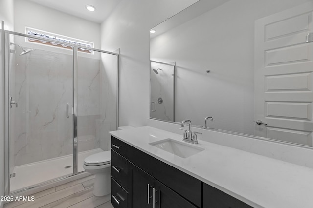 3260 W Caleb Rd, Phoenix, AZ 85083 - bathroom featuring toilet, a marble finish shower, vanity, recessed lighting, and wood tiled floors