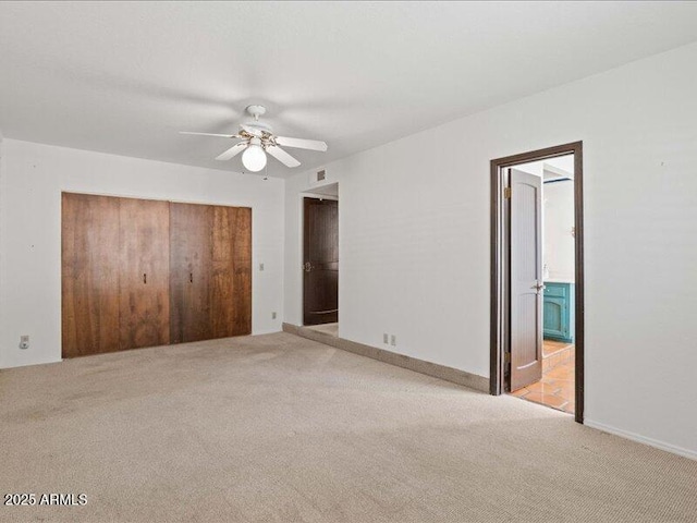 7232 N 22 Nd St, Phoenix, AZ 85020 - unfurnished bedroom featuring light carpet, ensuite bathroom, and ceiling fan