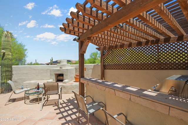 32826 N 54th St, Cave Creek, AZ 85331 - view of patio / terrace featuring exterior fireplace and a pergola