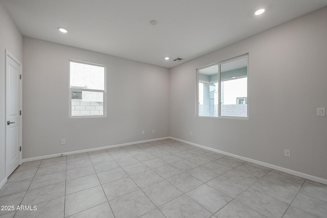 view of tiled spare room