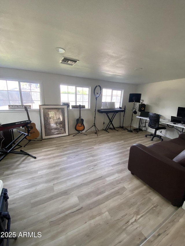 7201 N 16th Dr, Phoenix, AZ 85021 - living room with wood finished floors and a desk