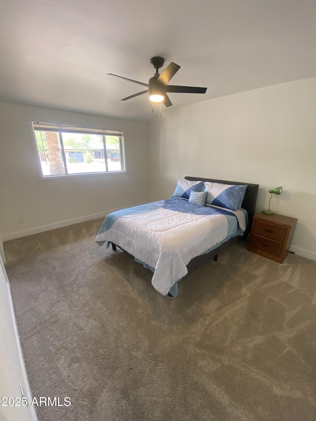 7201 N 16th Dr, Phoenix, AZ 85021 - carpeted bedroom with baseboards and a ceiling fan