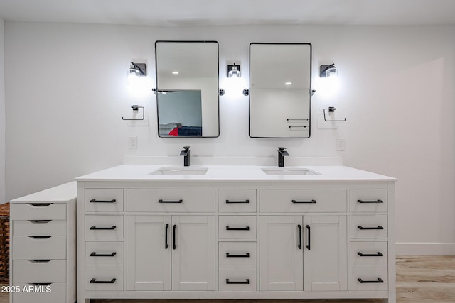 7201 N 16th Dr, Phoenix, AZ 85021 - full bathroom with double vanity and wood finished floors