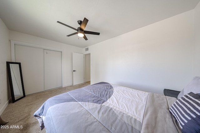 7201 N 16th Dr, Phoenix, AZ 85021 - carpeted bedroom with a closet, ceiling fan, and baseboards