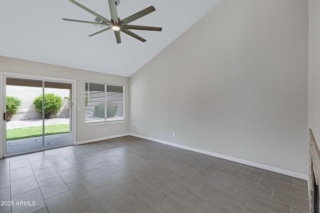 empty room featuring high vaulted ceiling, baseboards, and a ceiling fan