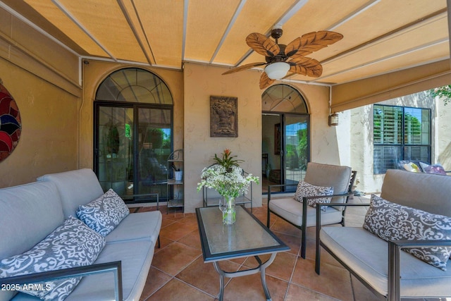 view of patio / terrace with ceiling fan and outdoor lounge area