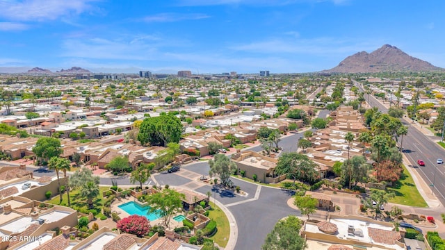 birds eye view of property with a residential view and a mountain view