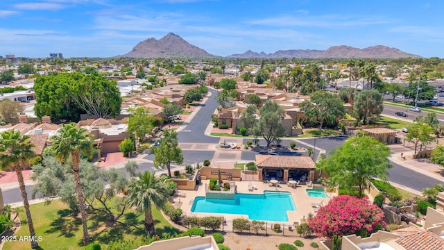 drone / aerial view featuring a residential view and a mountain view