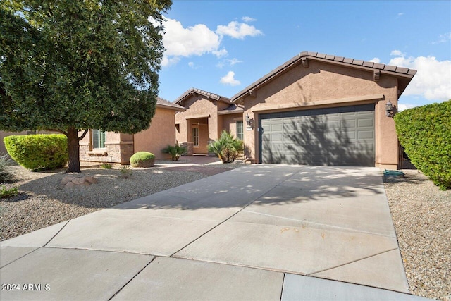 view of front of property featuring a garage