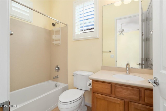 full bathroom with ceiling fan, vanity, toilet, and shower / bathing tub combination