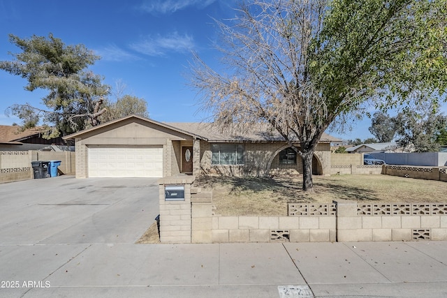 ranch-style home featuring a garage