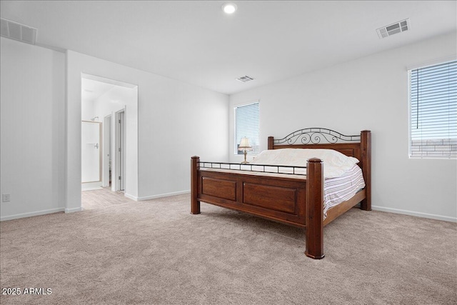 bedroom with carpet flooring and visible vents