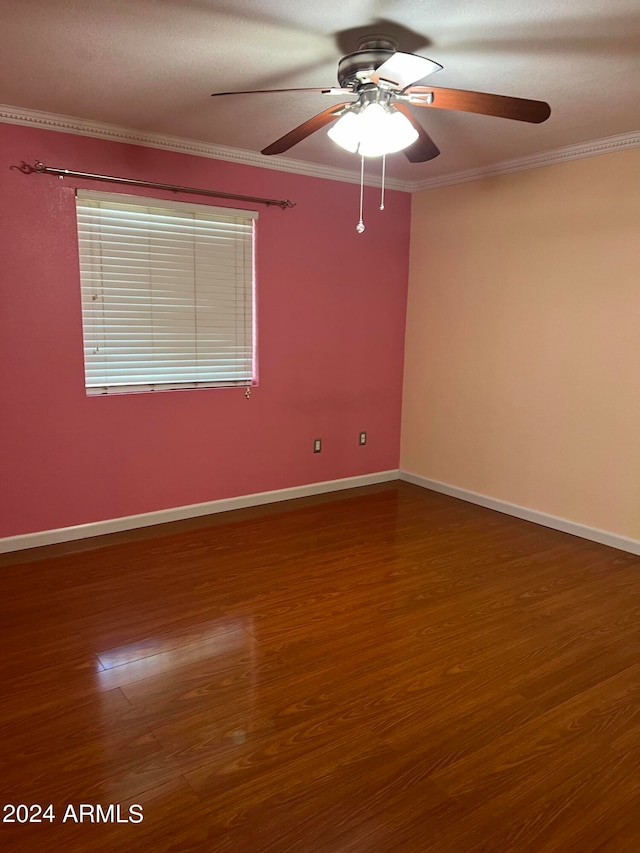 unfurnished room featuring ornamental molding, hardwood / wood-style floors, and ceiling fan