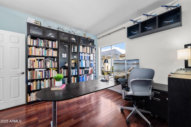 office with hardwood / wood-style flooring