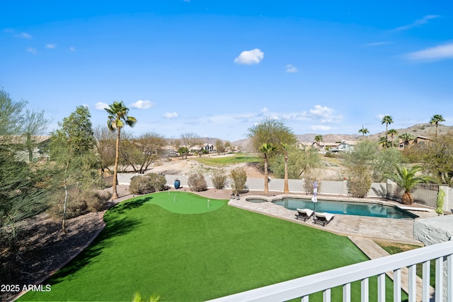 view of yard with a patio, a fenced in pool, and a fenced backyard