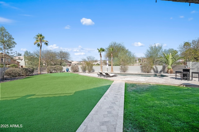 view of yard with a fenced backyard and a patio area