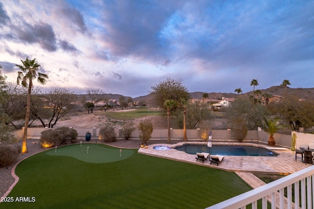 view of pool featuring a fenced backyard, a fenced in pool, and a patio