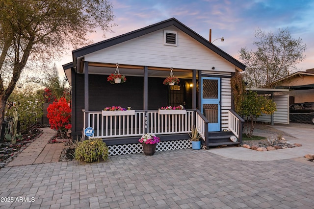 bungalow-style house with covered porch