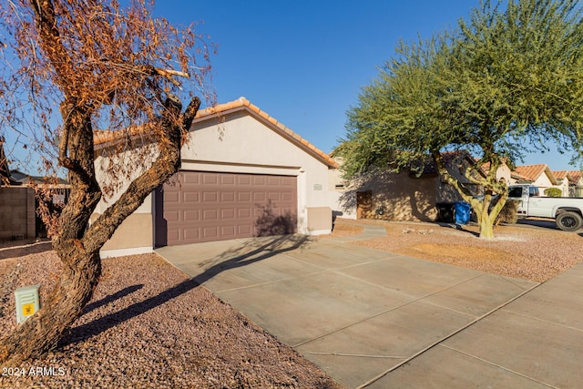 view of front of property with a garage