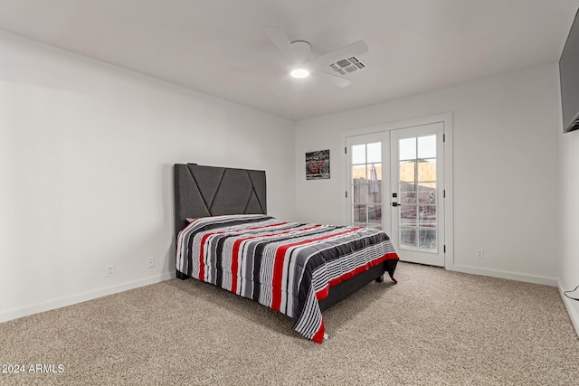 carpeted bedroom featuring ceiling fan, access to outside, and french doors