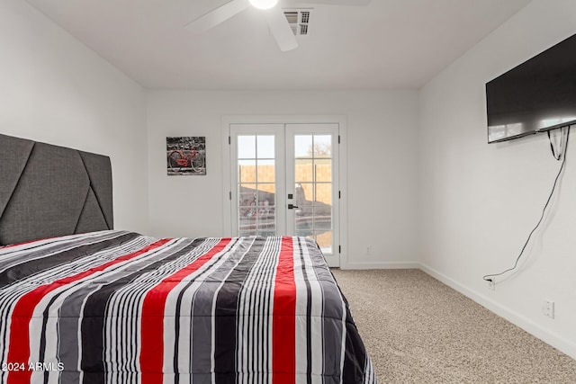 carpeted bedroom featuring ceiling fan, access to exterior, and french doors