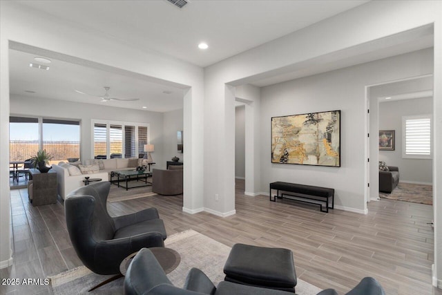 living room with ceiling fan