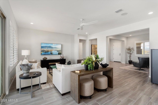 living room with ceiling fan