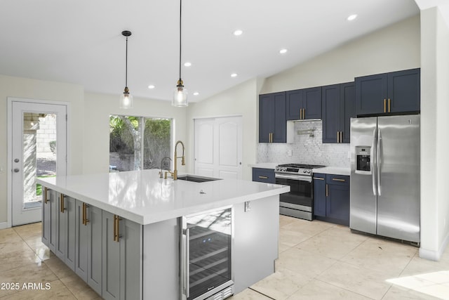 6920 W Via Montoya Dr, Glendale, AZ 85310 - kitchen with appliances with stainless steel finishes, a sink, lofted ceiling, wine cooler, and backsplash